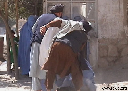 Taliban beating women in public