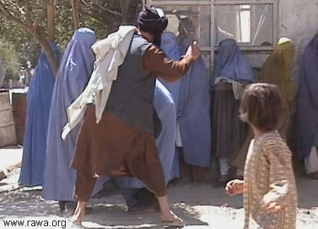 Taliban beating women in public