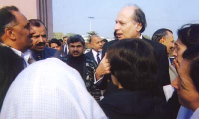 Mr Khalid Anwar, Law, Justice and Human Rights Minister of Pakistan speaking with the participants of the sit-in.