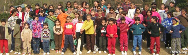 A number of children of RAWA orphanages in a picnic