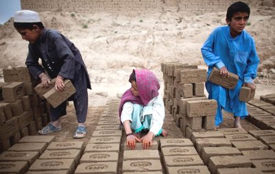 Afghan children in bricks factory