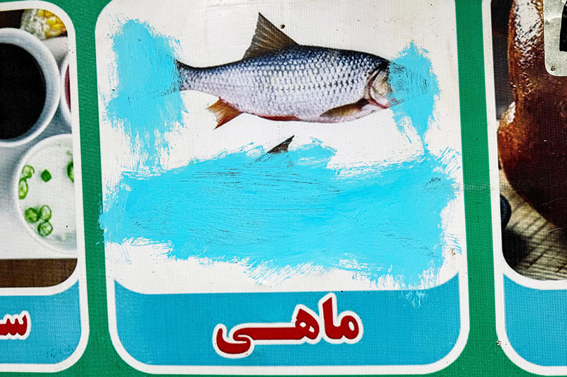 Images of living things, including a fish at a restaurant in Lashkar Gah in Helmand province, are often censored in Afghanistan since the Taliban takeover